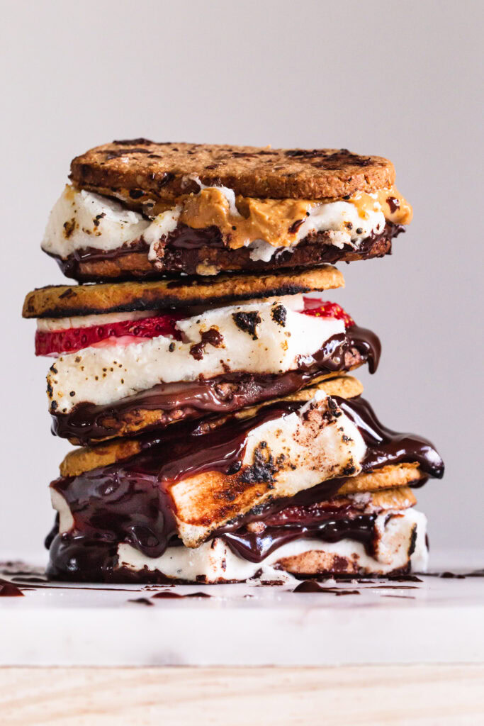 a stack of three different kind of vegan s'mores.