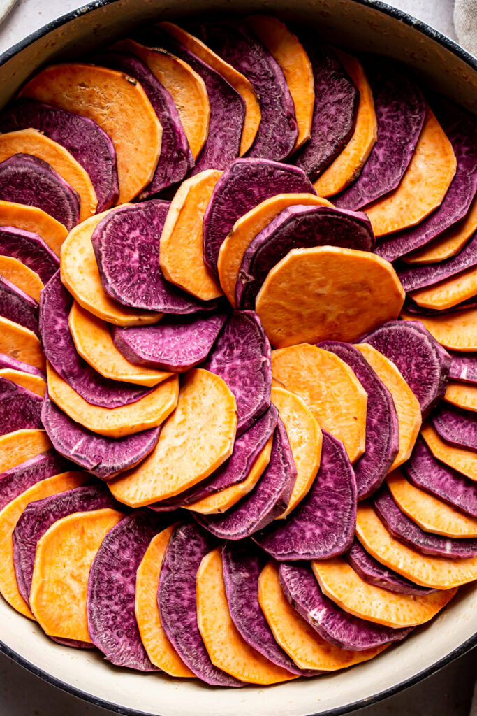 a close up of the unfrosted sweet potatoes in a swilrl pattern with alternating purple and orange sweet potatoes