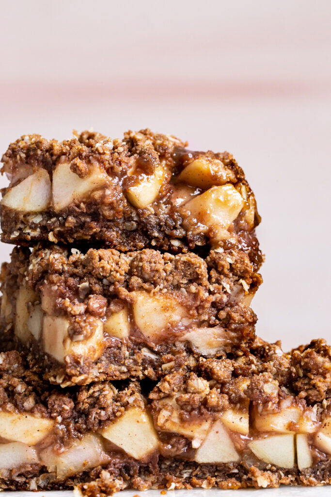 caramel apple crumb bars stacked on top of each other
