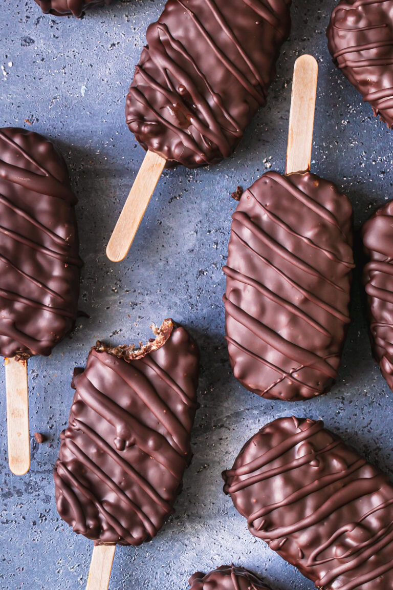 chocolate covered cocoa Krispie crunch pops lined up next to each other