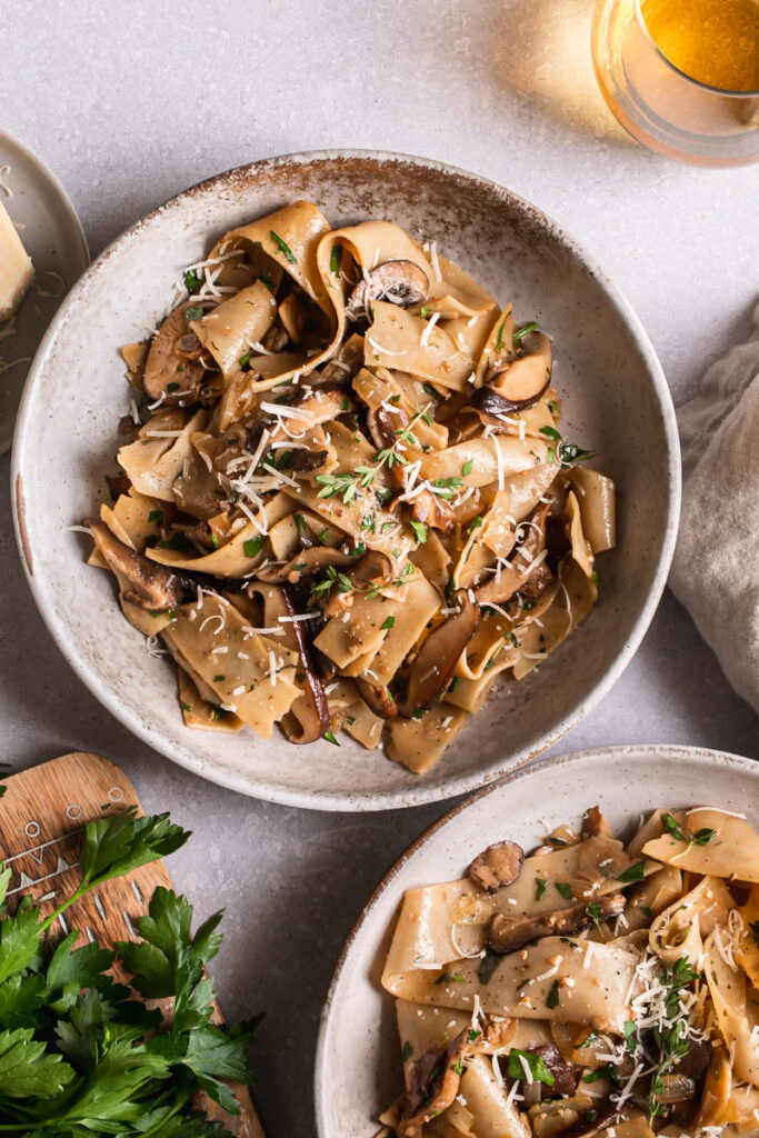 two bowls of gluten-free pappardelle with wild mushroom Ragù