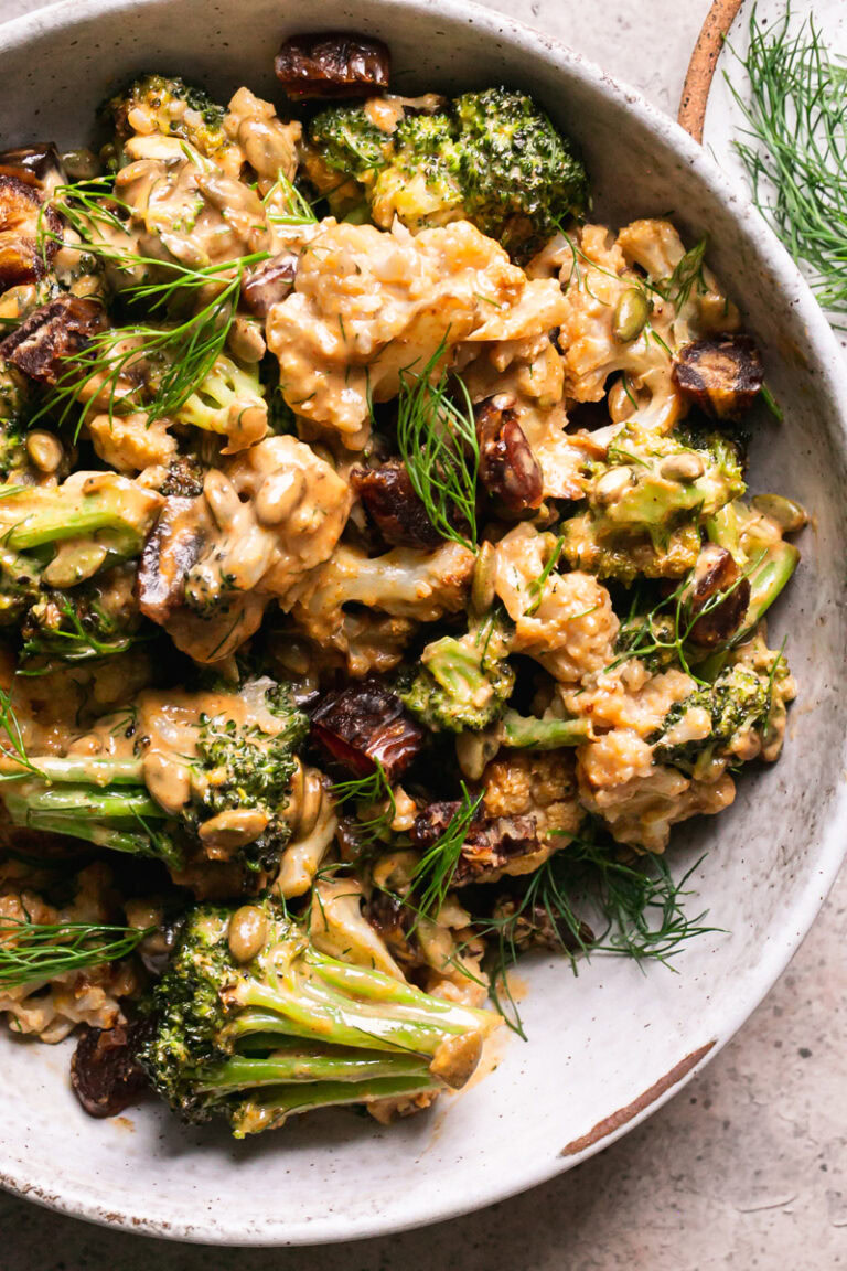 a close up overhead shot of a bowl of tahini harissa cauliflower