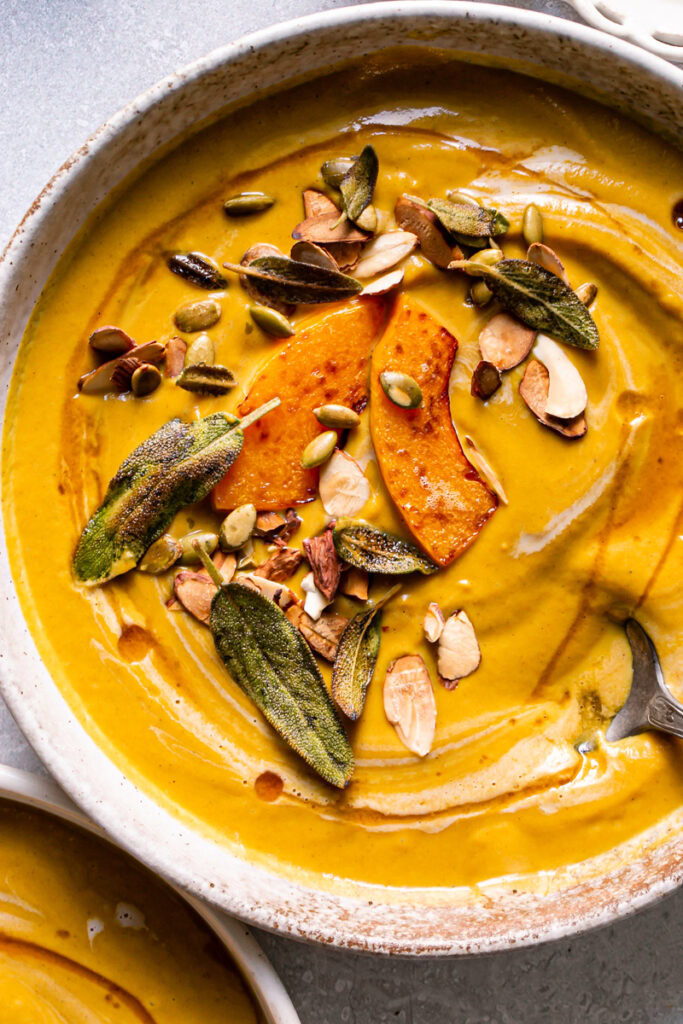 close up of a bowl of Roasted Butternut Squash Carrot Soup