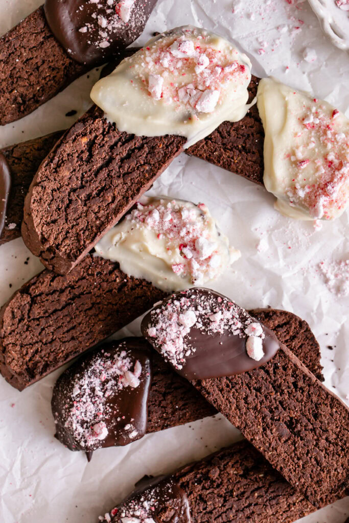 a close up shot of Gluten-Free Chocolate Peppermint Biscotti stacked on top of each other