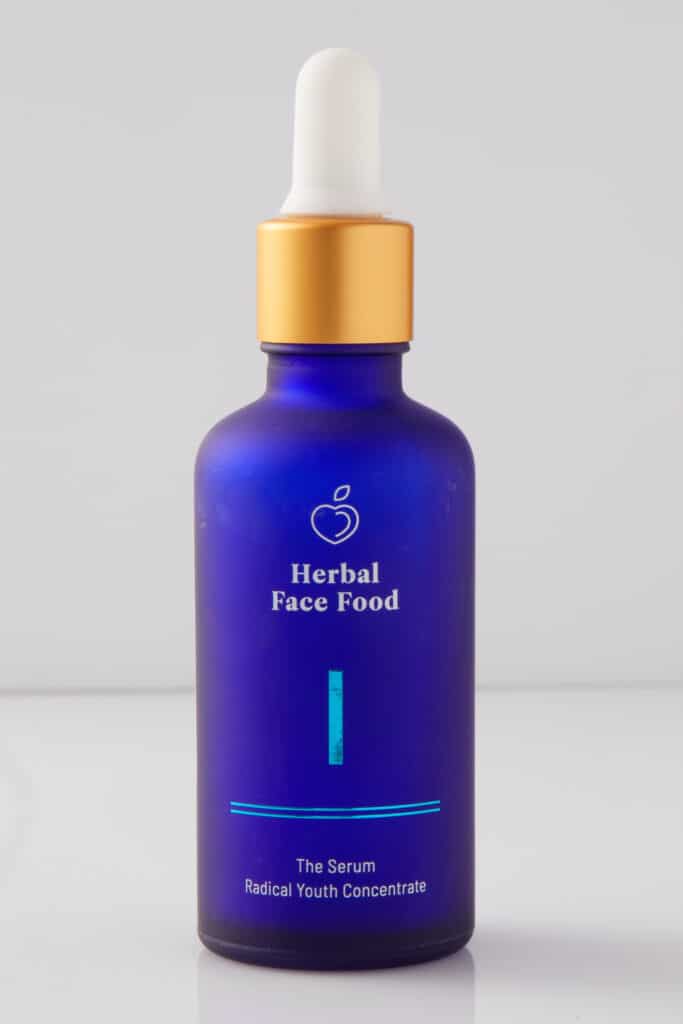 a bottle of herbal face food serum 1