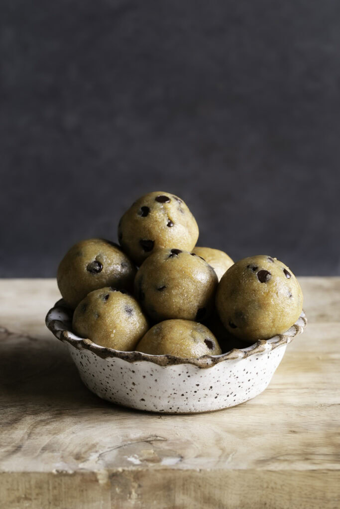 a bowl of almond flour chocolate chip cookie dough bites.