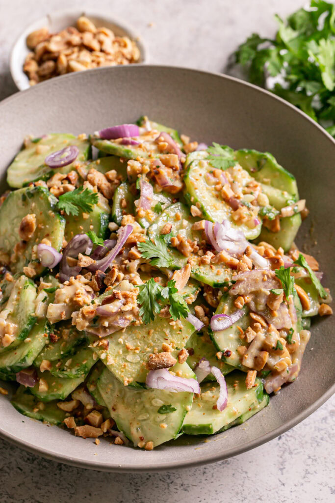 close up 3/4 shot of Miso Cucumber Salad with Shallot and Roasted Peanuts