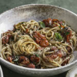 a bowl of bruschetta pasta.