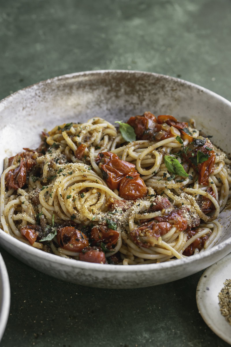 a bowl of bruschetta pasta.