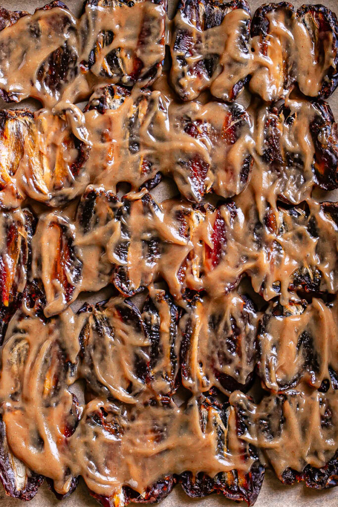 healthy vegan peanut butter caramel spread over the smashed dates