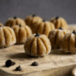 Sugared Almond Flour Pumpkin Cookie Dough on a wooden cutting board