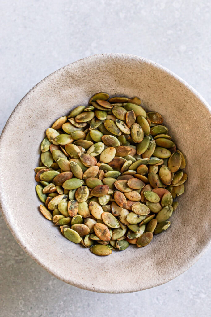 a bowl of toasted pumpkin seeds