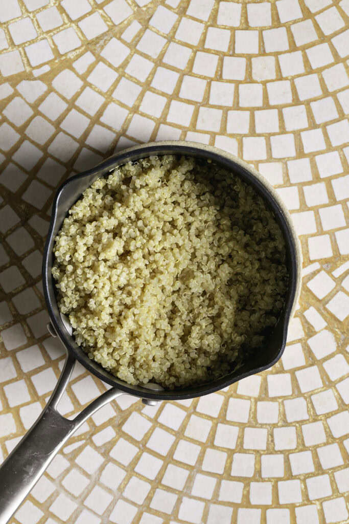 cooked quinoa in a small saucepan.