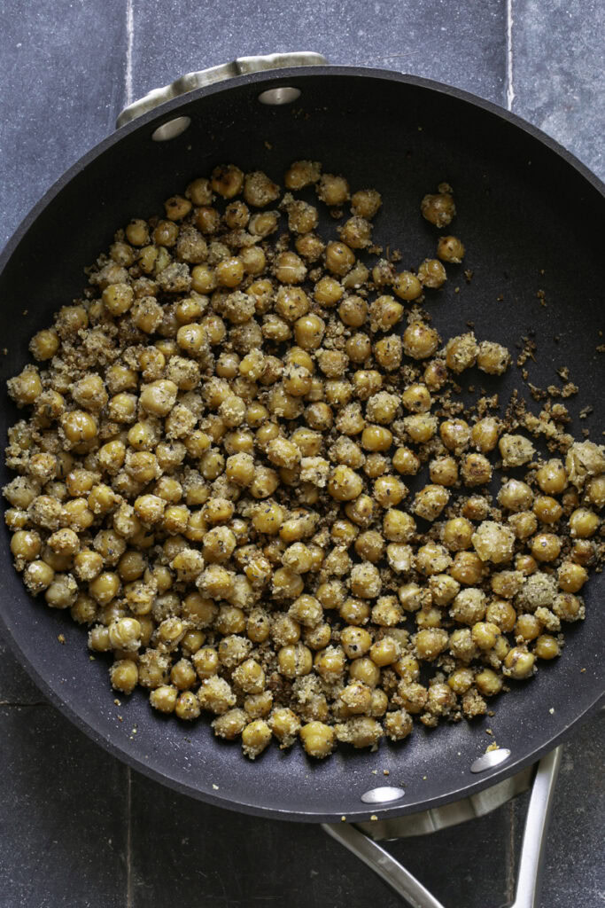 cooked chickpea croutons in a skillet.