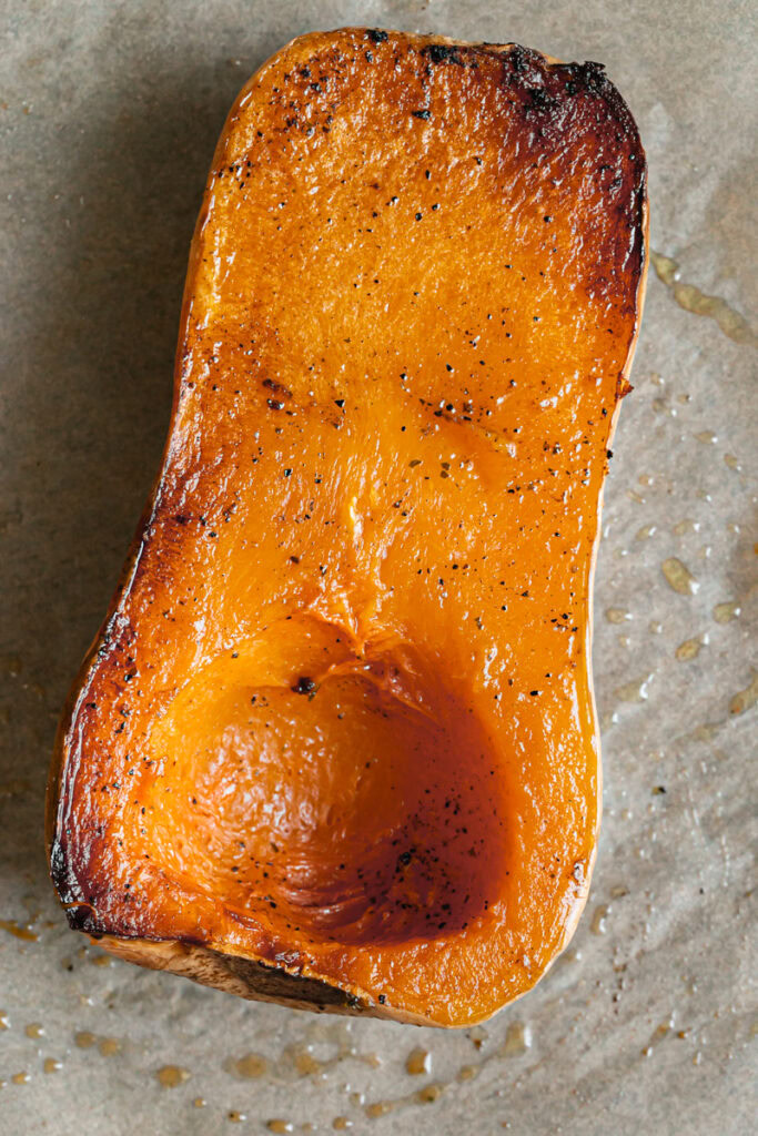 a roasted half of butternut squash.