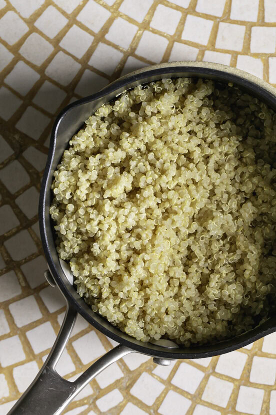 cooked quinoa in a small saucepan.
