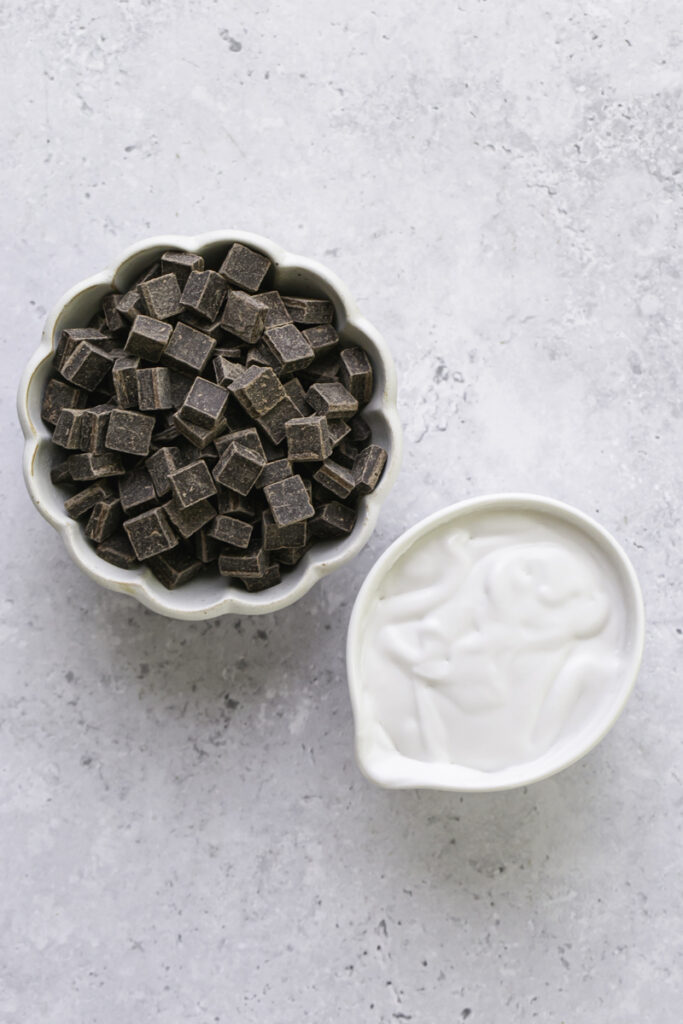 chocolate chunks and coconut milk in separate bowls.