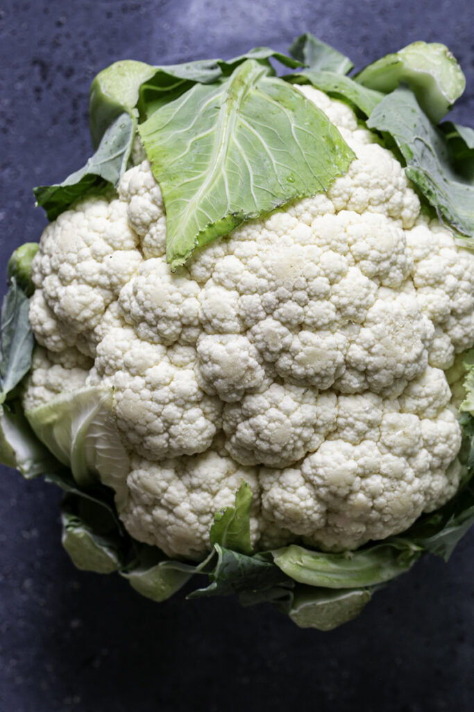a close up of a whole head of cauliflower.
