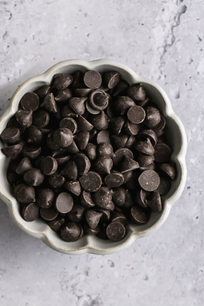 a bowl of dark chocolate chips.