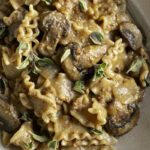homemade one pan vegan beef stroganoff hamburger helper served in a bowl garnished with fresh oregano.
