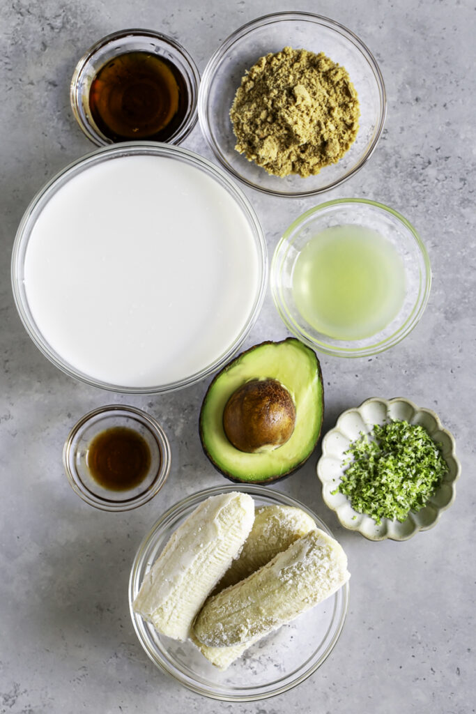 all of the ingredients used to make this key lime pie smoothie in separate bowls.