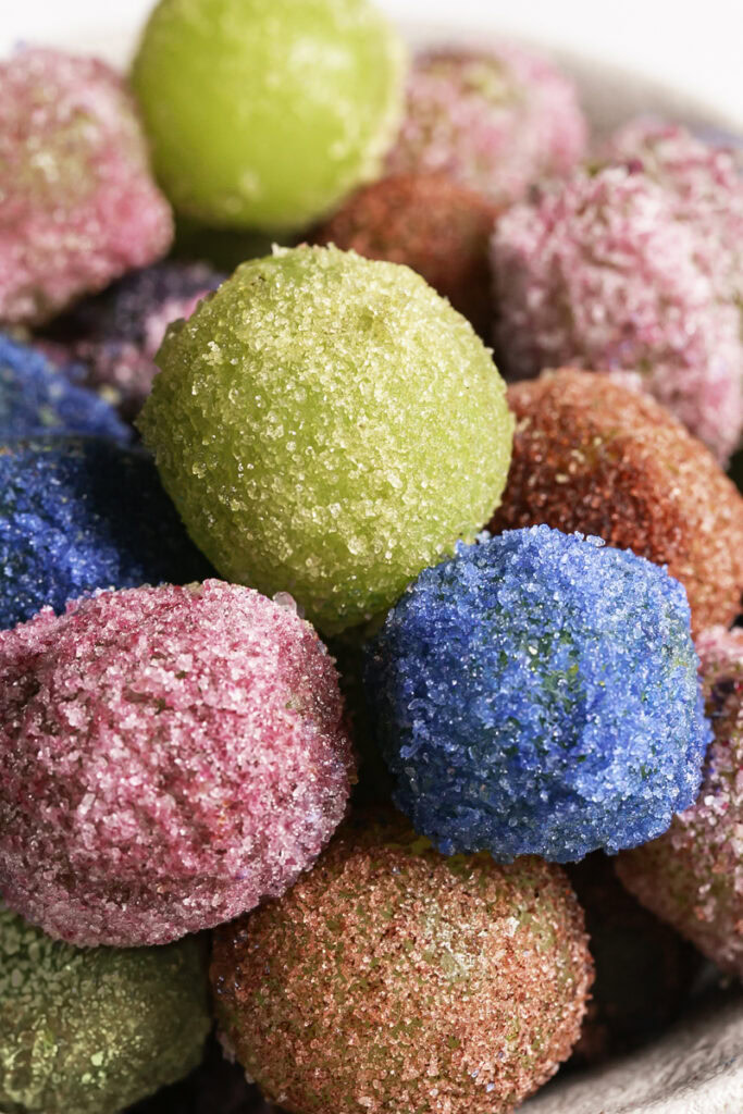 a very close up image of sour patch grapes.