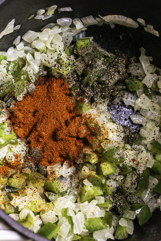 sauteed green pepper and onion in a saucepan with smoked paprika, salt, and pepper.