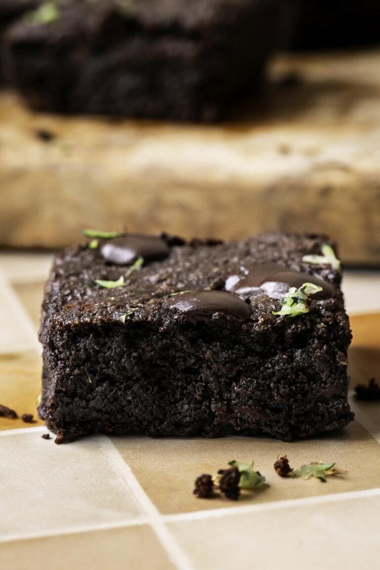 a close up of a single Almond Flour Zucchini Tahini Brownie.