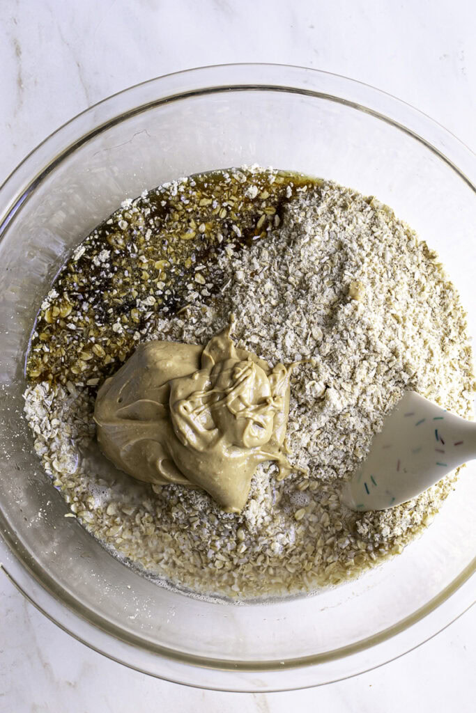 all of the ingredients unmixed in a glass bowl.