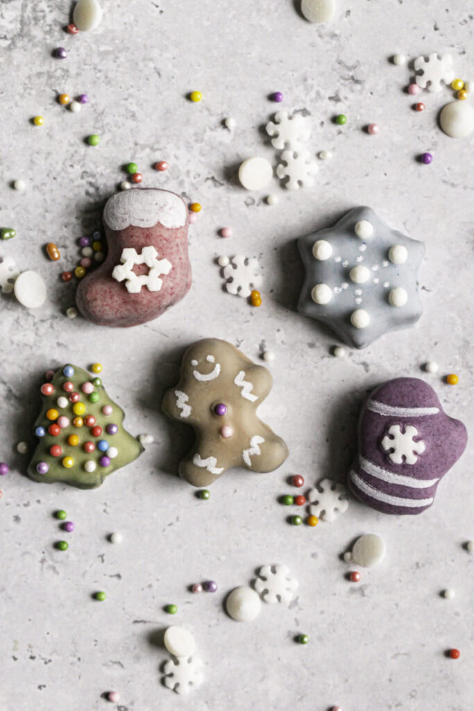 one each of all the mini cookie shapes with sprinkles around them.