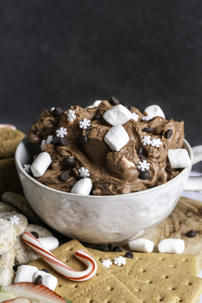 close up of creamy vegan hot cocoa dip in a mug.