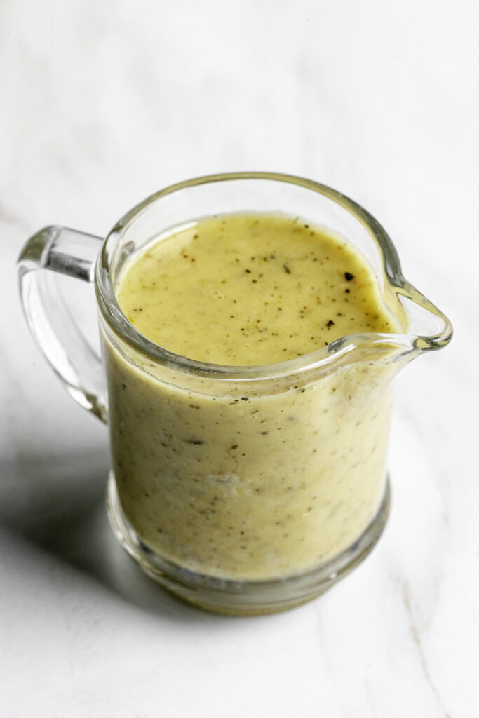 a jar of homemade italian vinaigrette dressing.
