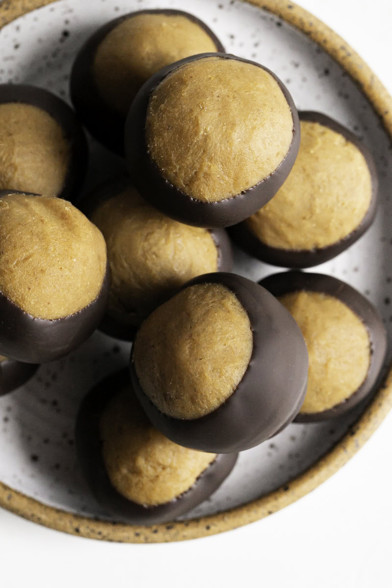 overhead shot of vegan buckeyes on a plate.