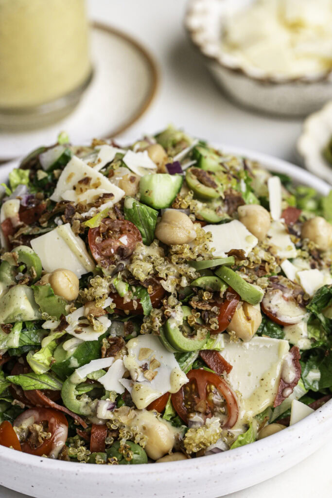 close up of Vegan Italian Chopped Salad with Herby Crispy Quinoa in a bowl.