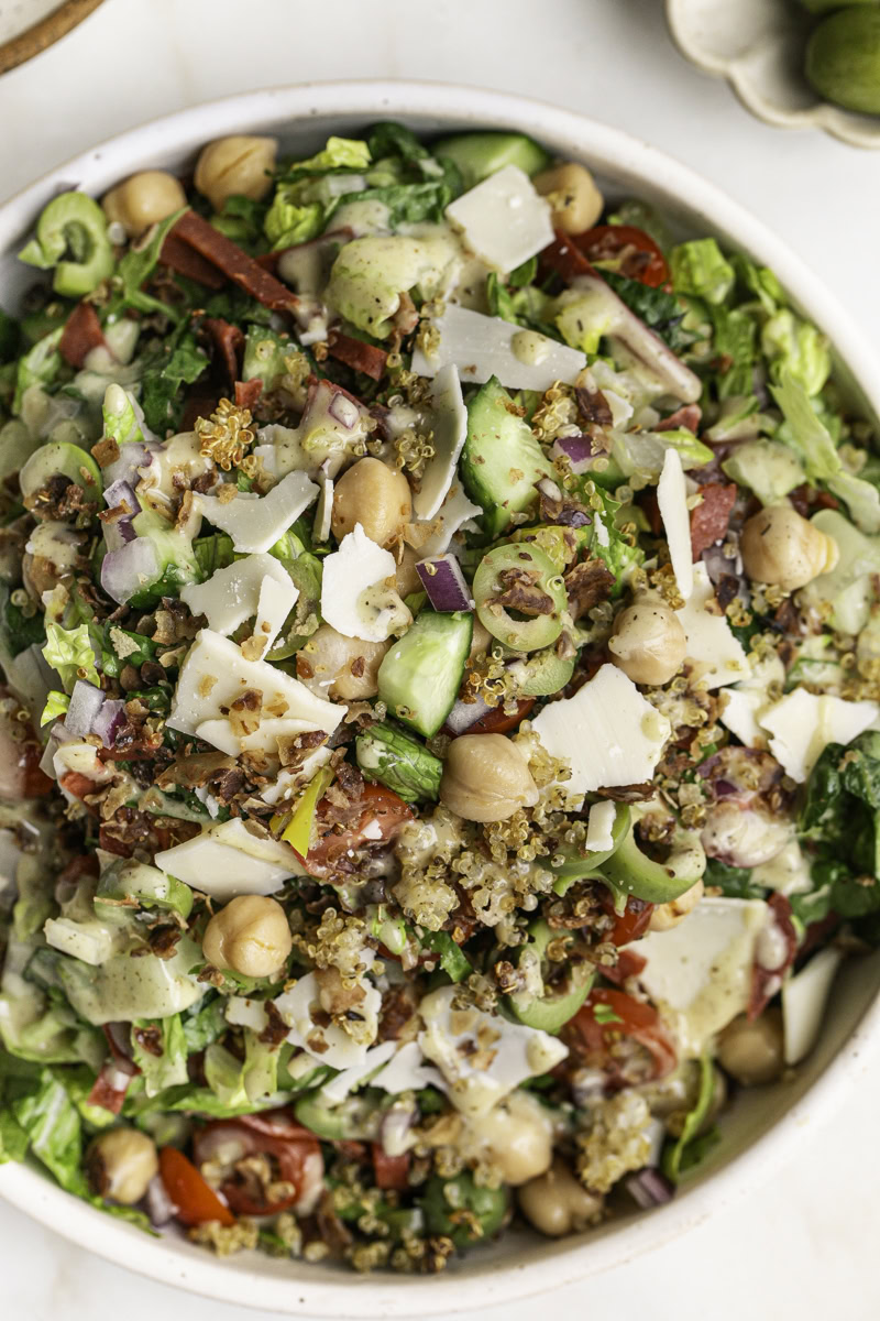 close up overhead of Vegan Italian Chopped Salad with Herby Crispy Quinoa in a bowl.
