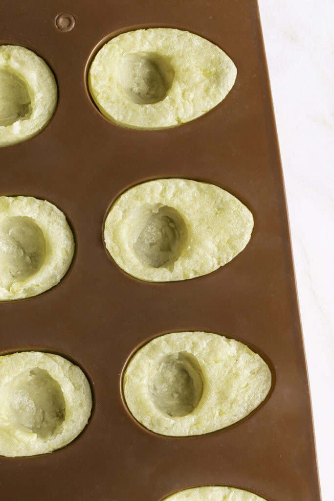 scooped centers out of the mashed potato "eggs".