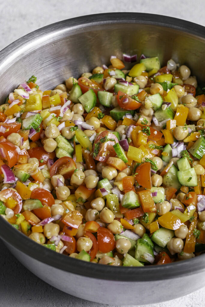 tossed chickpea salad in a large bowl.