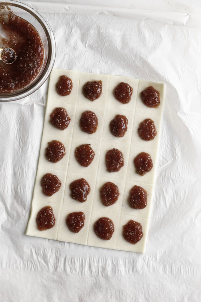 strawberry chia jam in the center of each pie dough rectangle.