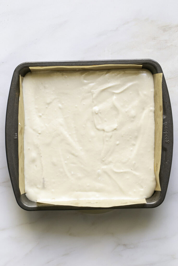 cheesecake filling spread on top of the cinnamon cookie crust.