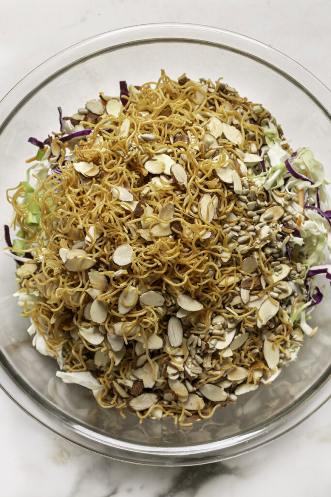 the crunchy baked ramen nut & seed mixture added to the bowl with the coleslaw.