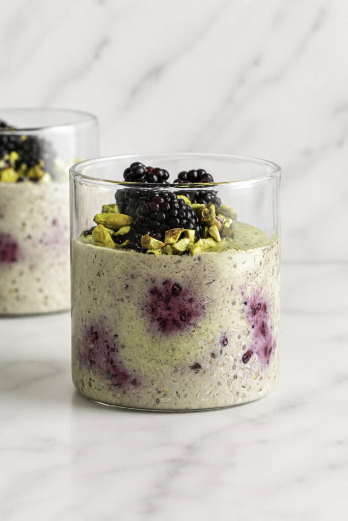 two jars of blackberry pistachio overnight oats.