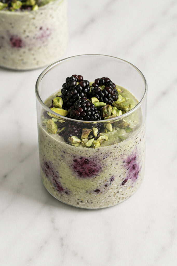 two jars of blackberry pistachio overnight oats.