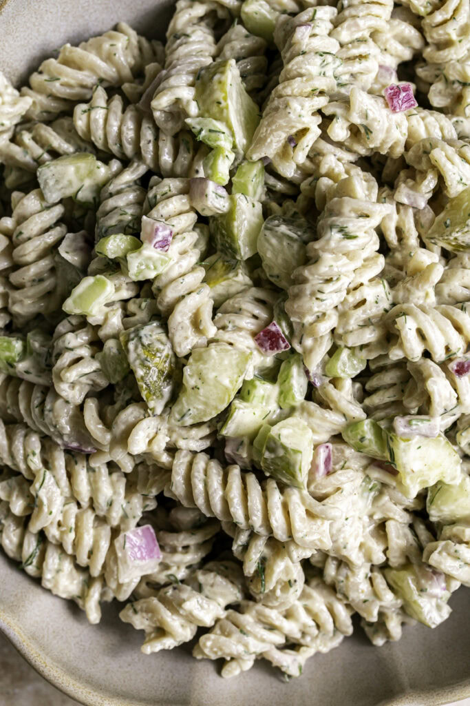 extreme close up overhead shot of dill pickle pasta salad.