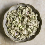 a big bowl of dill pickle pasta salad.