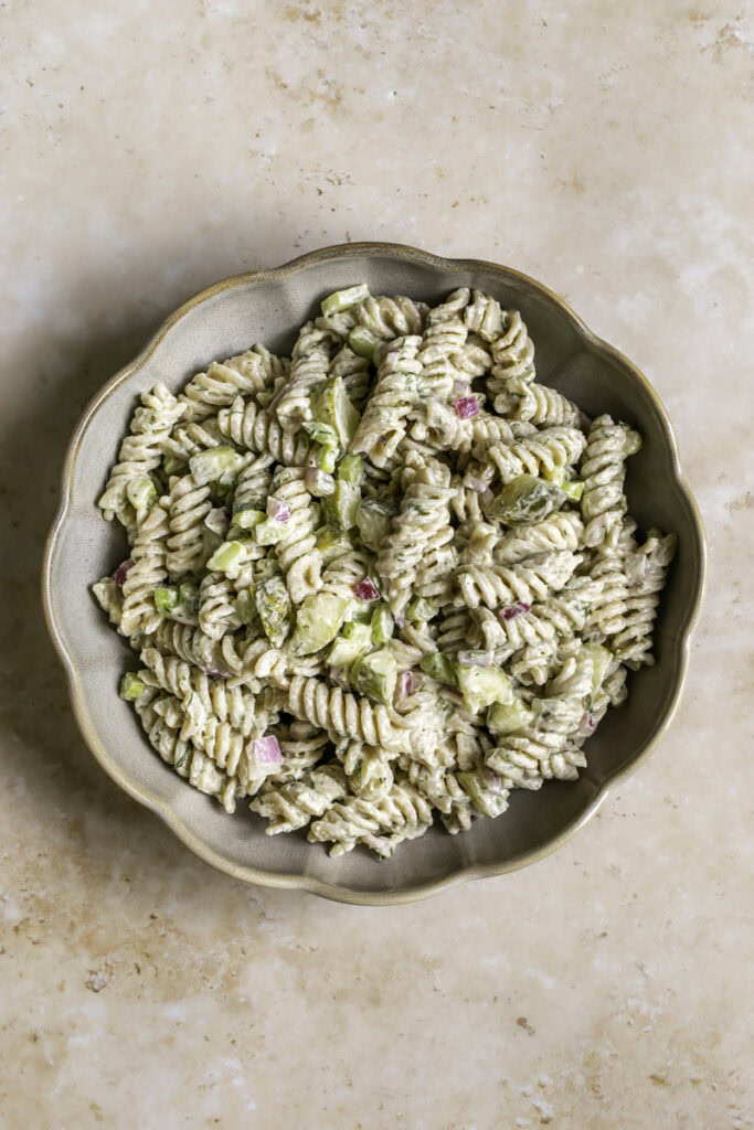 a big bowl of dill pickle pasta salad.