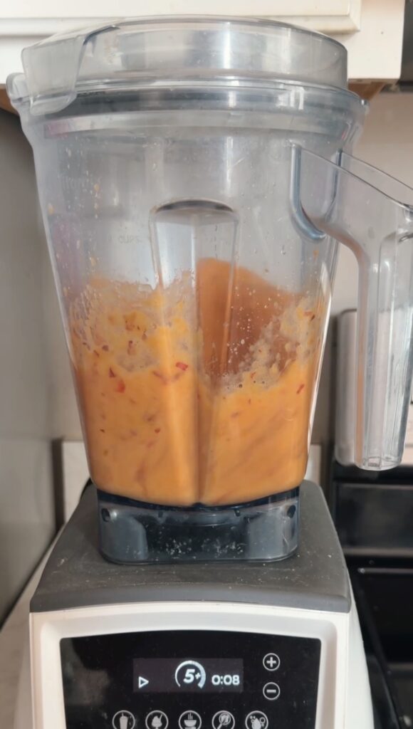 blending the nectarines in a blender.