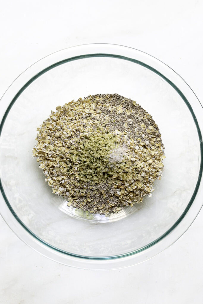 dry overnight oats ingredients in a glass bowl.
