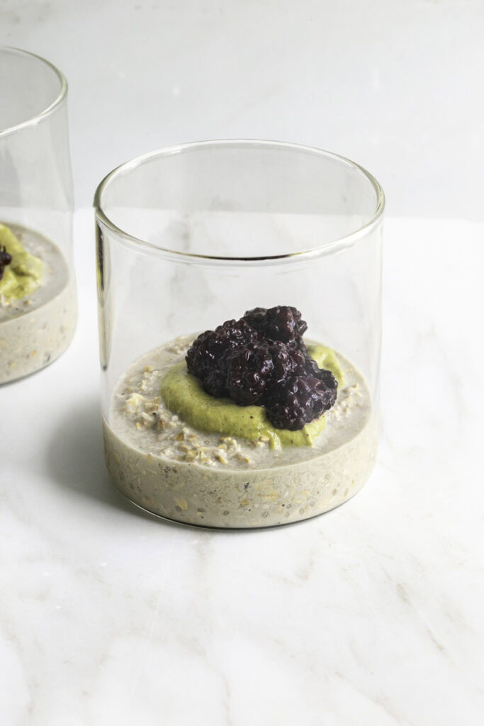 blackberry compote spooned on top of the pistachio cream and oats.