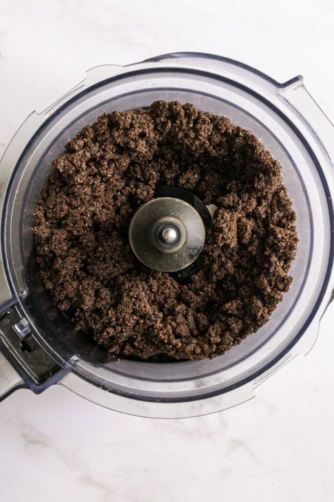 mixed up brownie cookie dough in a food processor.