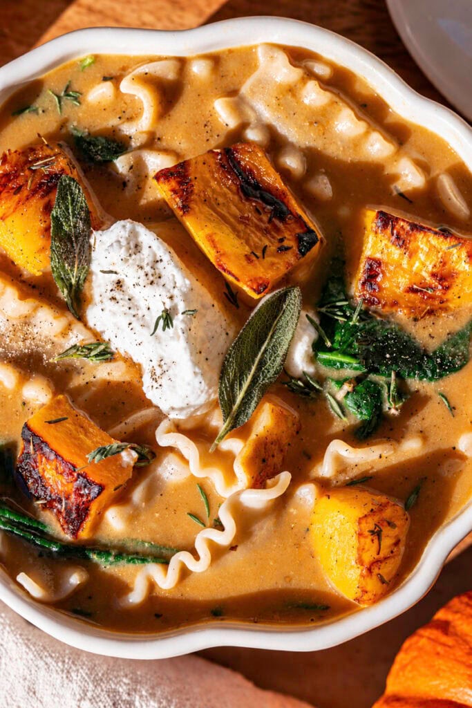close up overhead shot of Creamy Roasted Pumpkin Lasagna Soup.